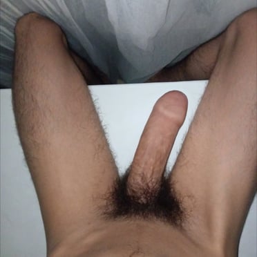 A thick, veiny cock with bushy pubic hair, a beautiful specimen of Swedish perfection, with a 25cm measurement.