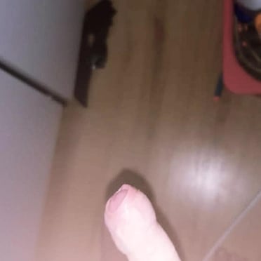 This juicy white cock pic shows off a thick, veiny 14cm dick with trimmed pubic hair.