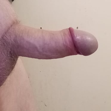 Beautiful thick cock with prominent balls and light pubic hair, offering a great dick pic.