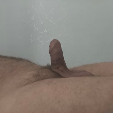 Here is a beautiful, thick cock pic featuring a hairy bush.