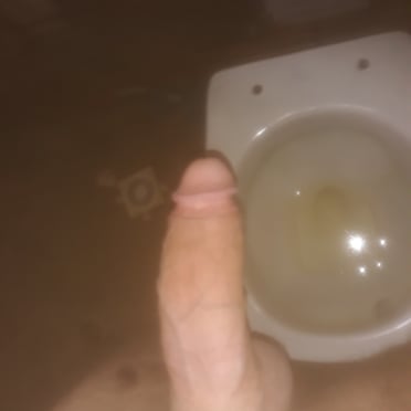 A thick, veiny white dick pic with a very hairy crotch.