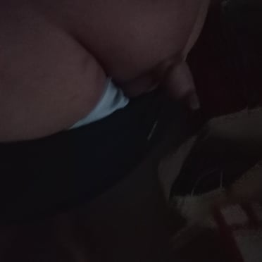 Here is a single sentence description for the image:
A thick, veiny dick peeking out from light blue briefs with smooth skin.