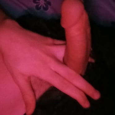 This thick, juicy cock pic features a light-skinned man with a beautifully shaped dick.