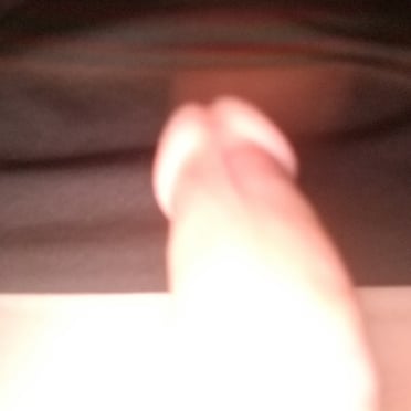 A beautiful, thick cock with a well-shaped head, shown in a close-up pic.