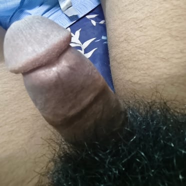Beautifully thick, dark dick with lush pubic hair, lovely uncut cock pics.