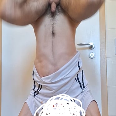 A thick, juicy cock with hairy balls is featured in this German dick pic.