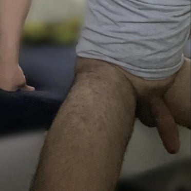 Amateur cock pic of a uncut, hairy, and well-hung dick in Afghanistan.