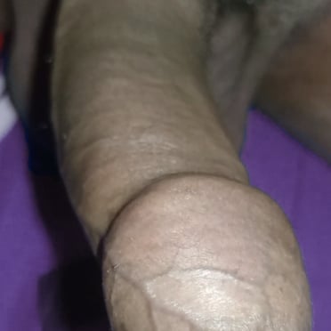 Check out this juicy, thick dick pic featuring veiny detail and trimmed pubic hair.