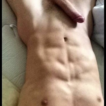 A thick, veiny cock with a muscular dude showing off his abs, beautiful pic.