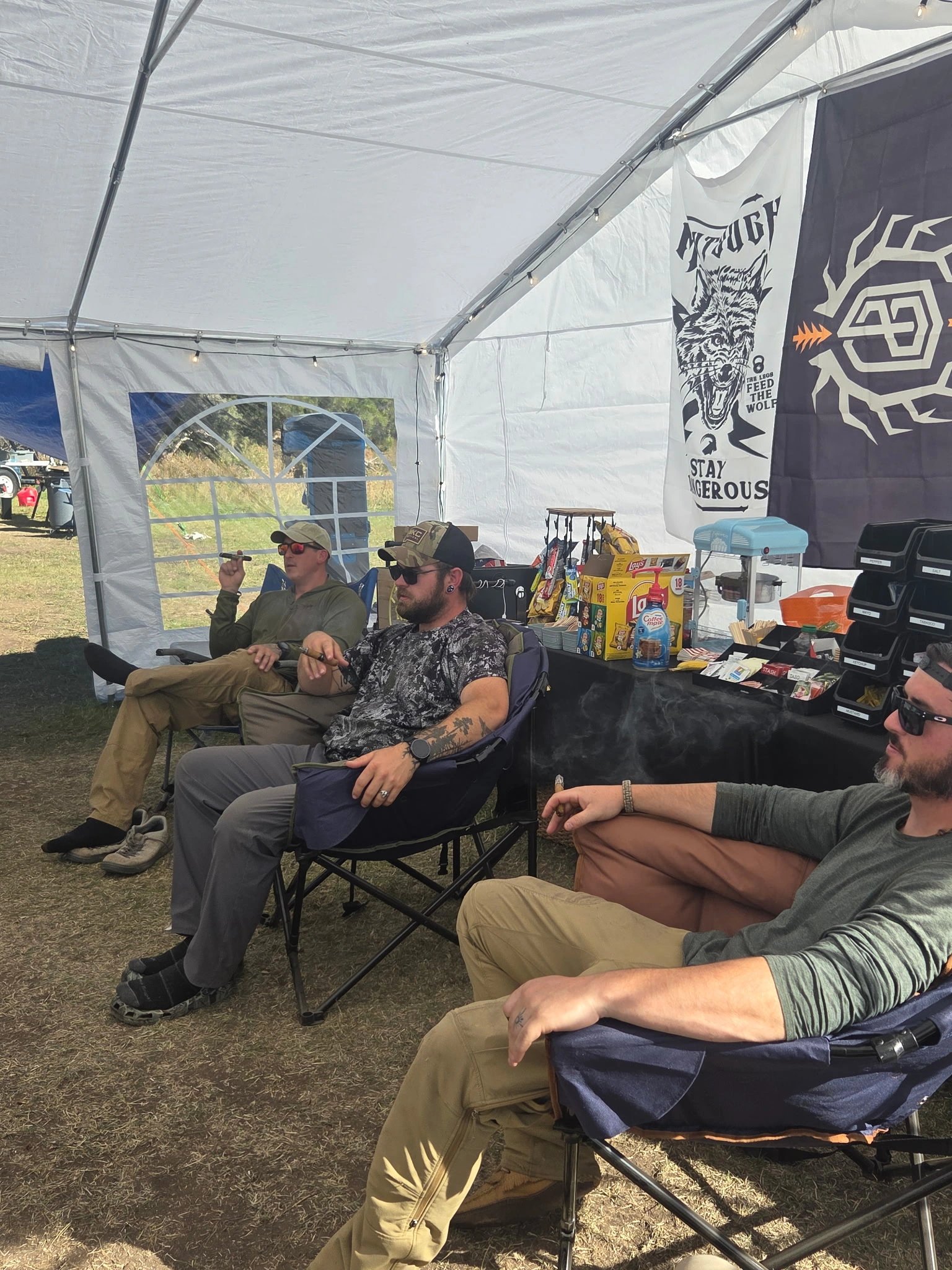 Participants spending time together inside the camp tent