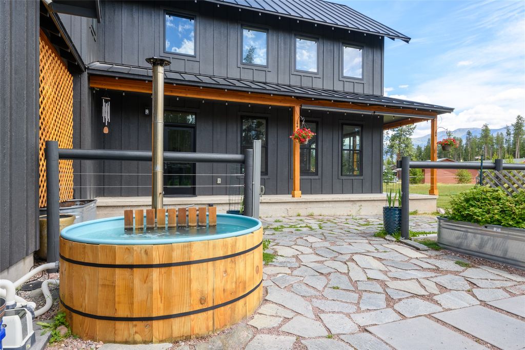 Seeley Lake home patio with hot tub