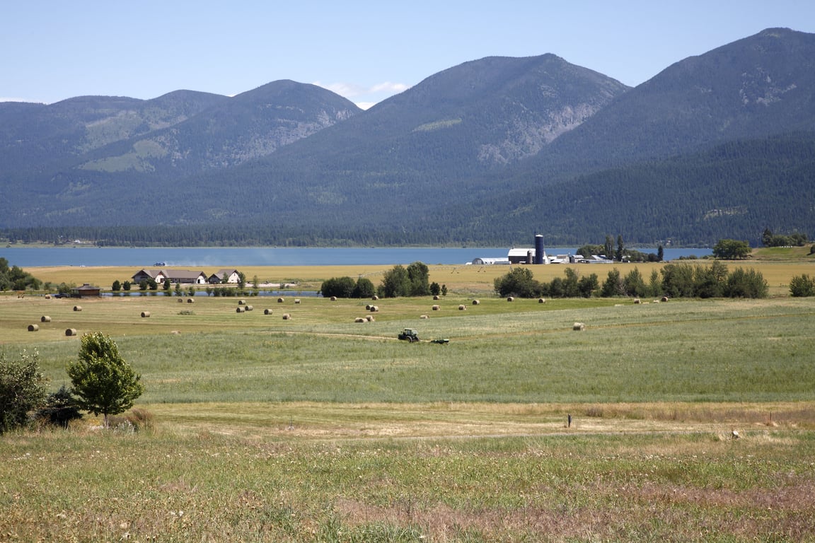 Summer view of Polson, MT, lake and farmland