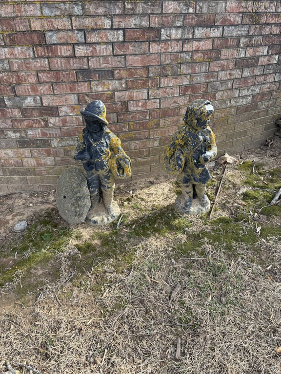 Two Concrete Statues