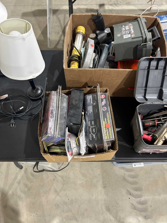 Box of universal trailer light kit, wire, etc