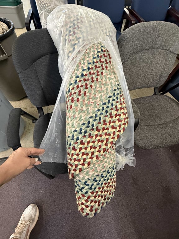 MULTI COLORED BRAIDED RUG