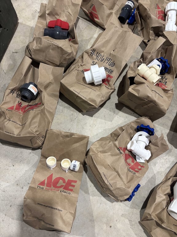Tote of misc PVC fittings, faucet handles, misc - Image 3