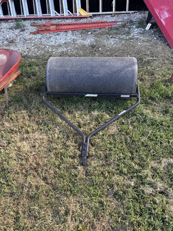 Pull behind lawn roller