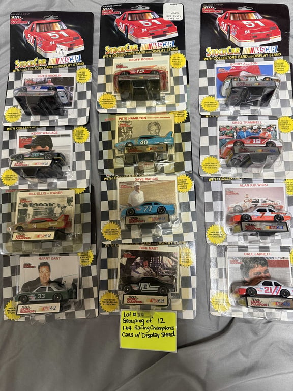 GROUPING OF 12 1:64 RACING CHAMPION CARS W/DISPLAY STANDS