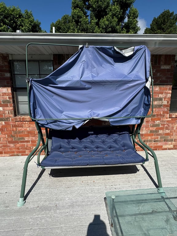 Covered swing