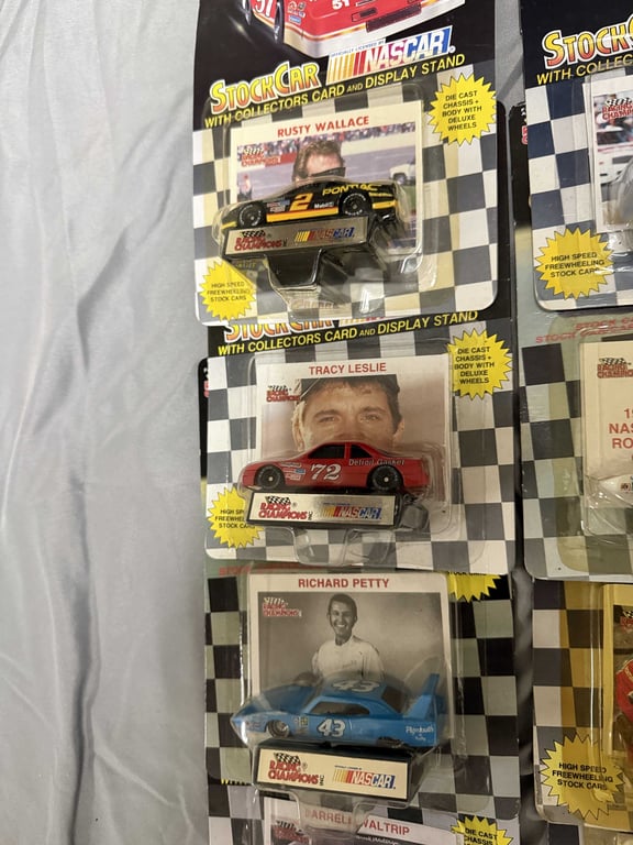 GROUPING OF 12 1:64 RACING CHAMPION CARS W/DISPLAY STANDS - Image 2