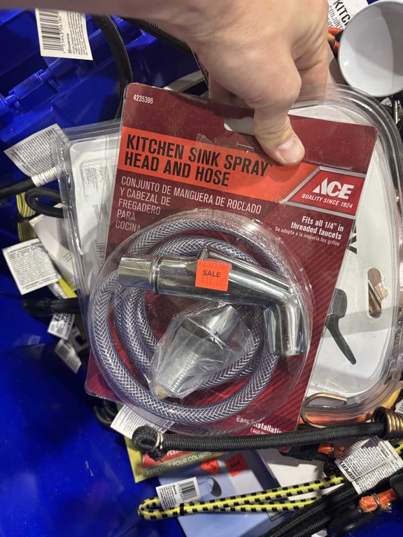Tote of bungee cords, filter wrenches, shower handles, string lights, etc - Image 3