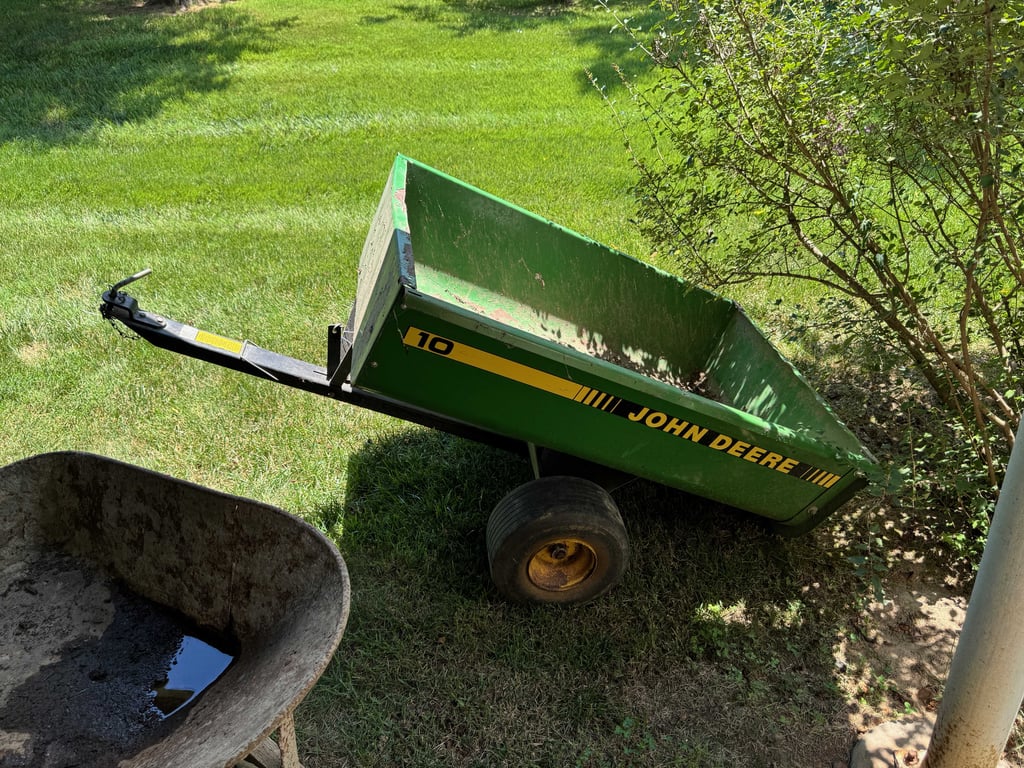John Deere pull behind metal dump cart
