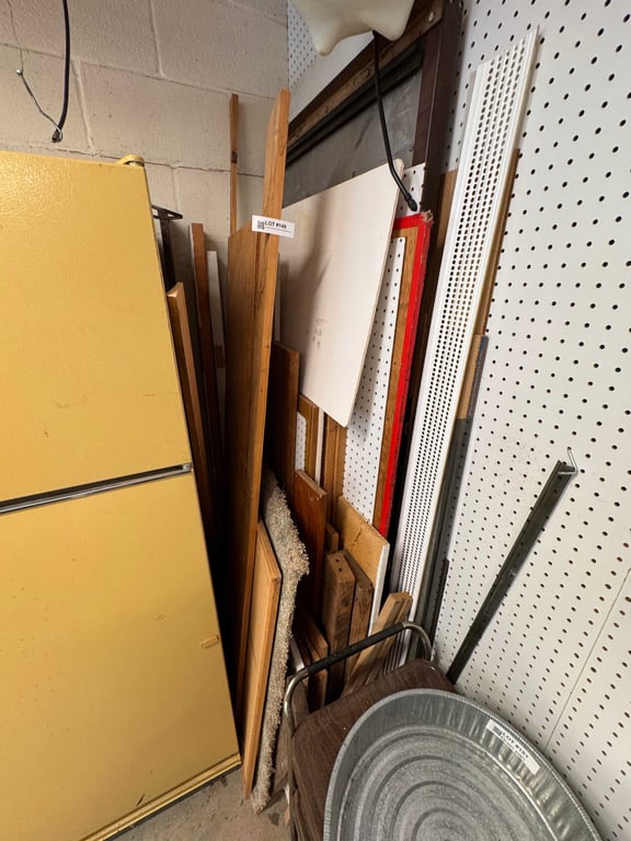 Contents of corner wood, loose pegboard, etc