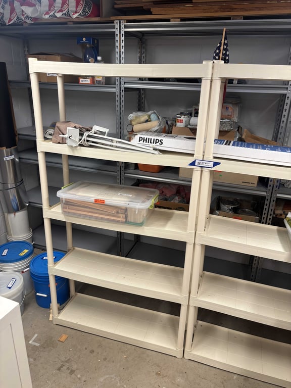2 plastic shelving units