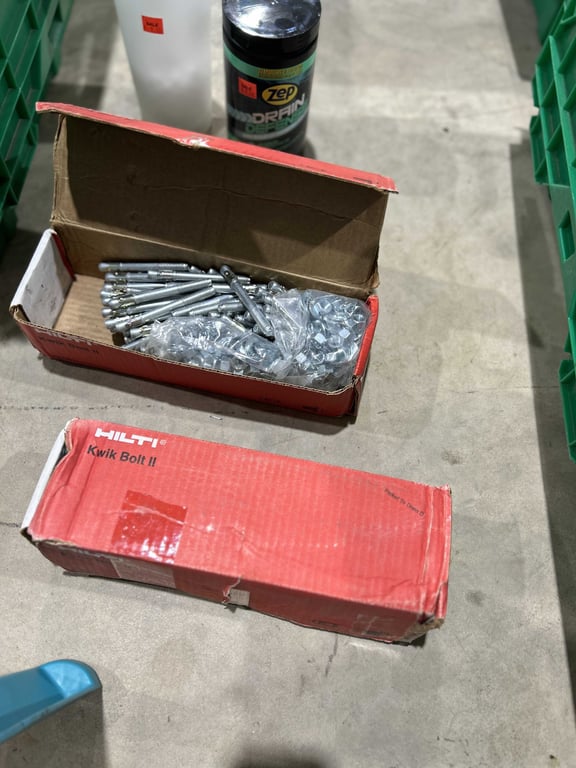 Tote of DAP, plastic shelving, Kwik bolts - Image 3