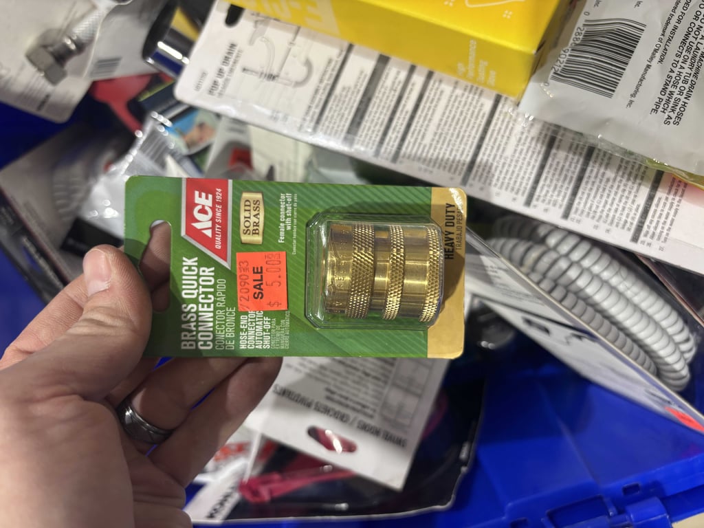 Tote of toilet flappers, spackling, toilet connectors, telephone line, extension cord, misc - Image 9
