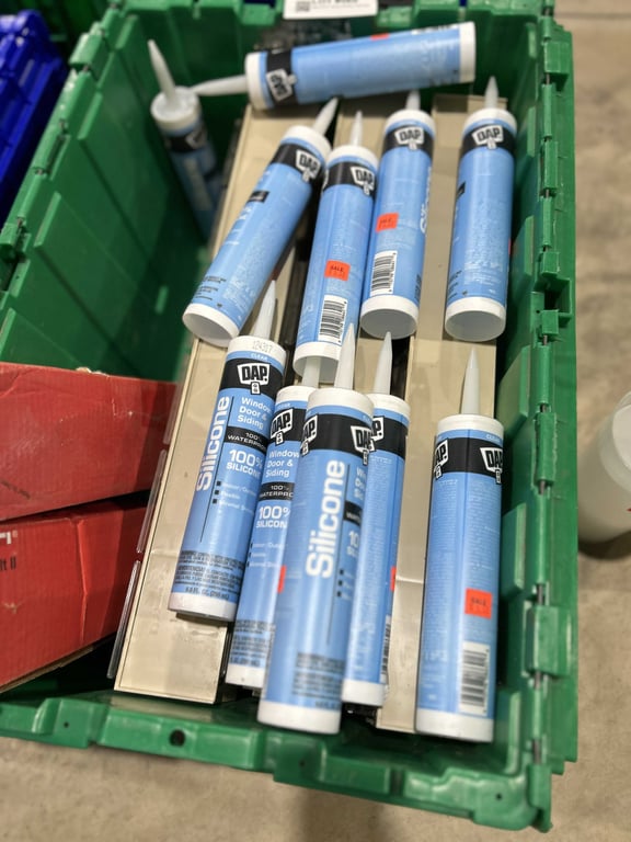 Tote of DAP, plastic shelving, Kwik bolts - Image 2