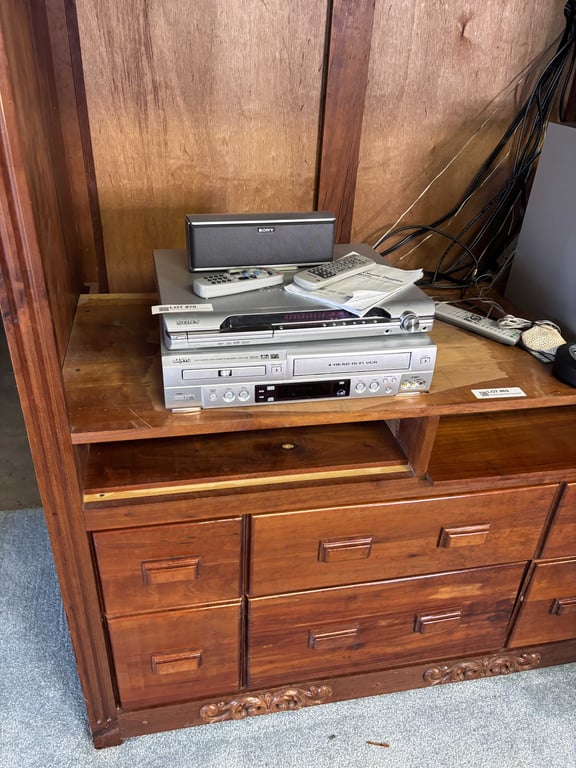 DVD/VHS Playe and Electronics in Cabinet