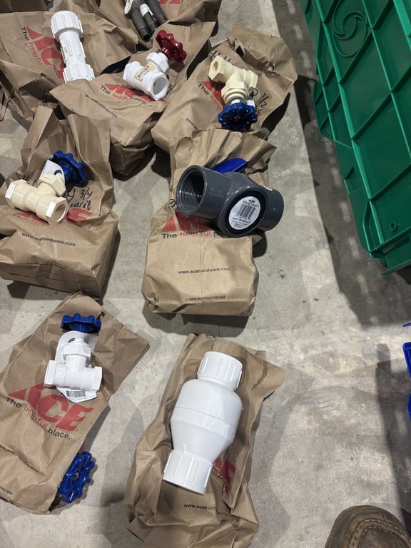 Tote of misc PVC fittings, faucet handles, misc - Image 4