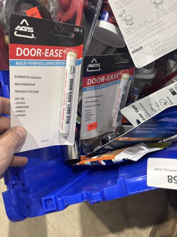 Tote of toilet flappers, spackling, toilet connectors, telephone line, extension cord, misc - Image 2