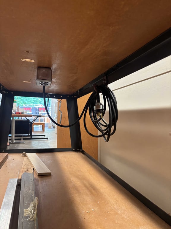 Work table with outlet and cord - Image 3