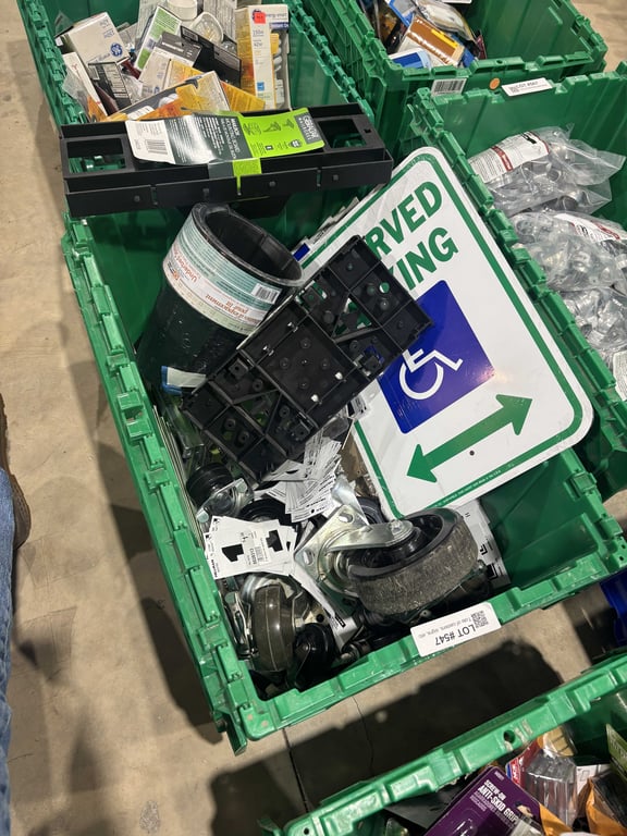 Tote of casters, signs, etc