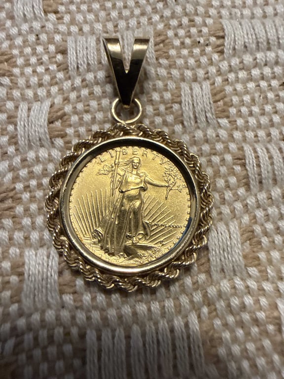 $5.00 Gold coin with 14k Bezel