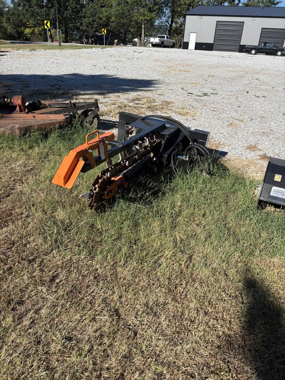 Skid steer trencher attachment