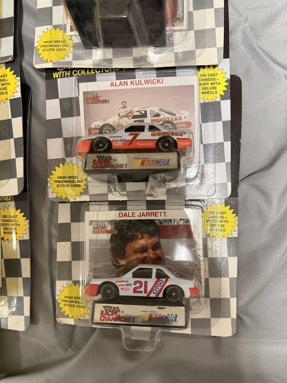 GROUPING OF 12 1:64 RACING CHAMPION CARS W/DISPLAY STANDS - Image 6