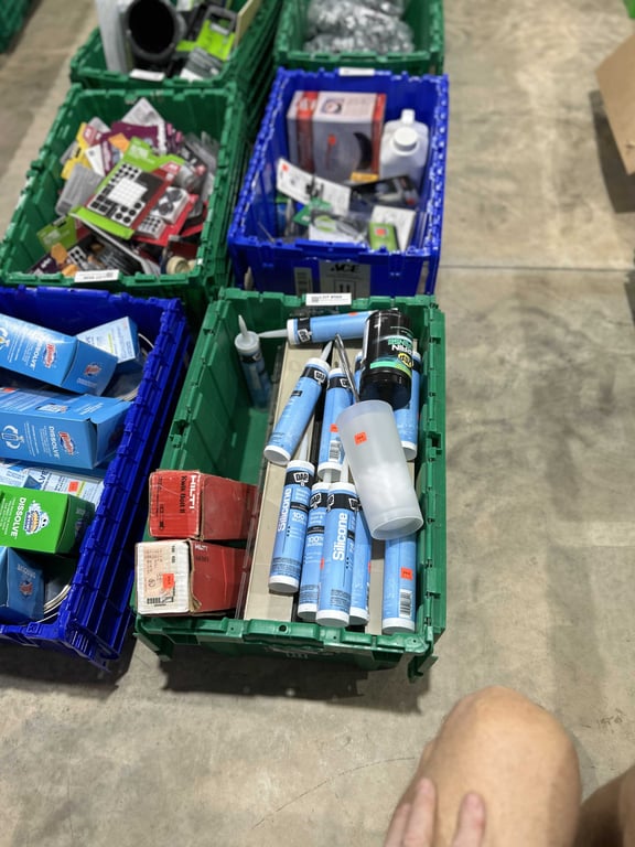 Tote of DAP, plastic shelving, Kwik bolts