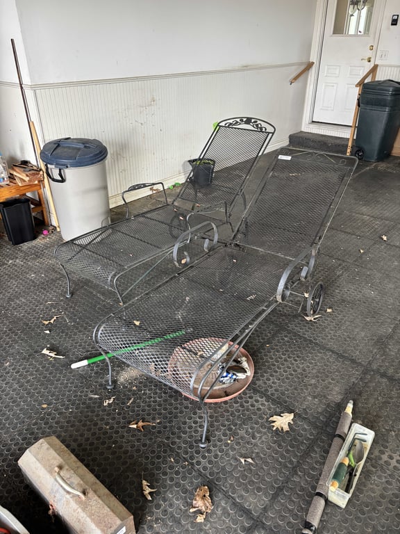 Two Iron Lounge Chairs