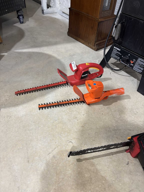 2 electric hedge trimmers