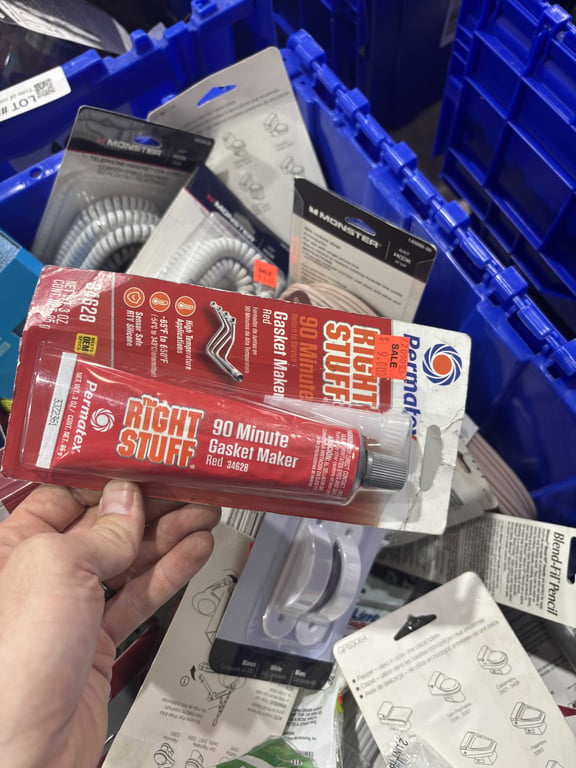 Tote of toilet flappers, spackling, toilet connectors, telephone line, extension cord, misc - Image 5