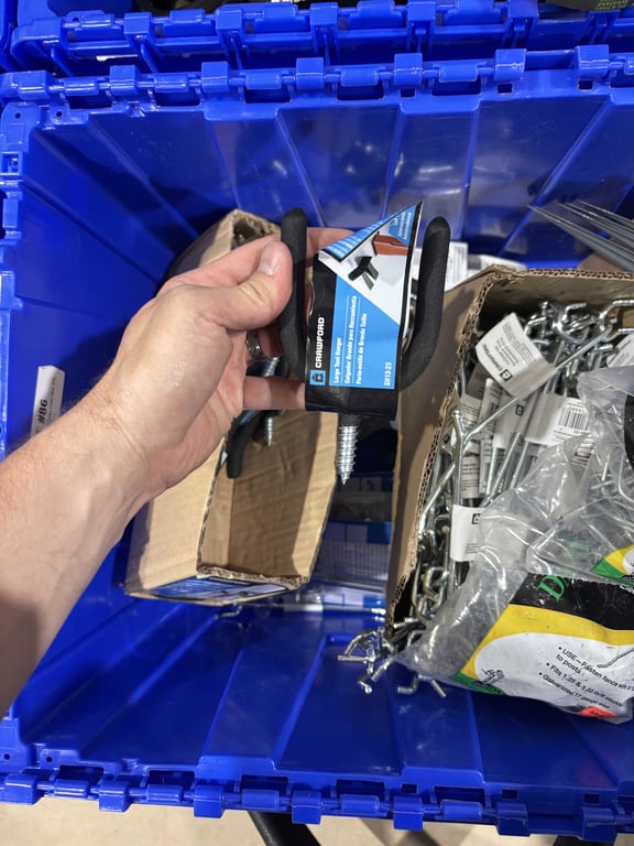 Tote of pegboard hooks, t post clips, tool hangers, etc - Image 3