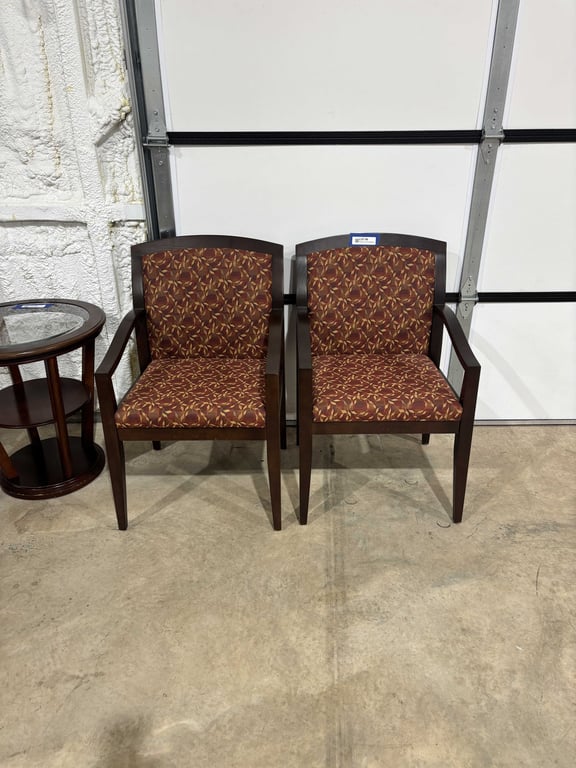 Matching red armchairs