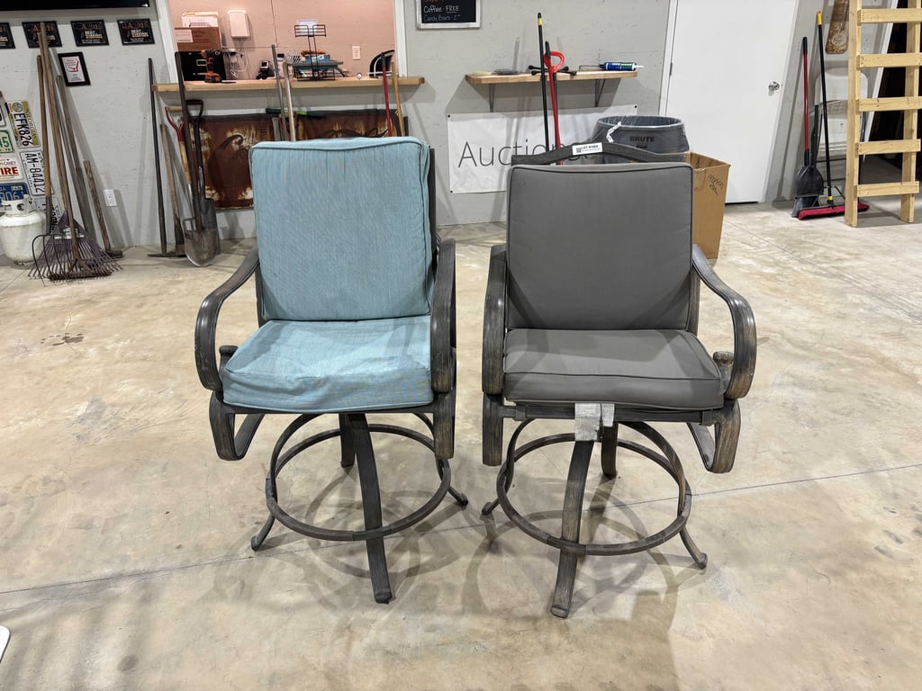 Two outdoor patio swivel chairs