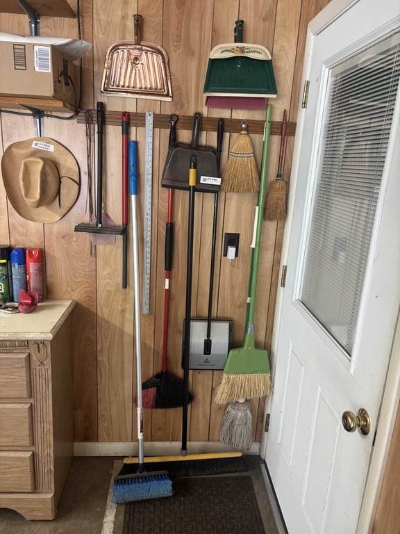 Brooms, dust pan, yard stick, misc