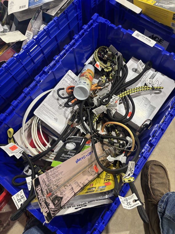 Tote of bungee cords, filter wrenches, shower handles, string lights, etc - Image 2