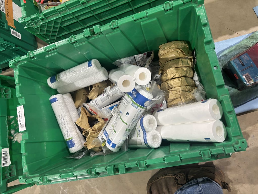 Tote of wire, water softener filters, misc
