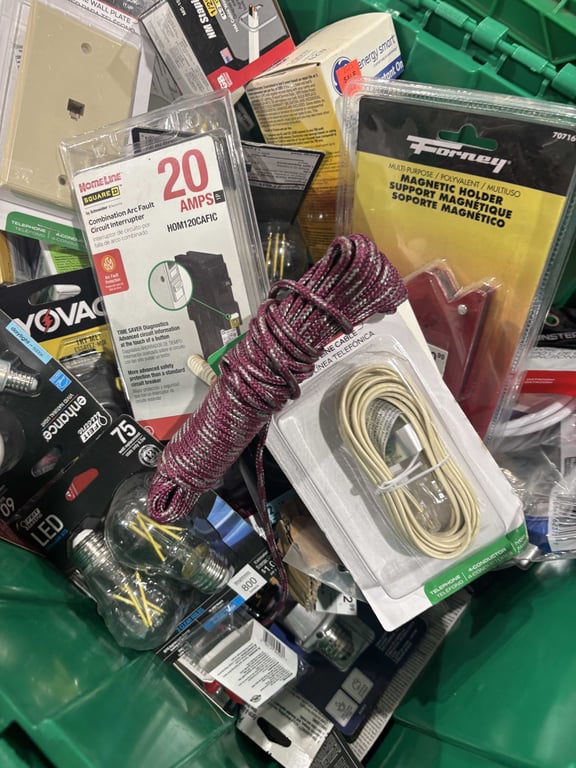 Tote of light bulbs, outlet covers, headphones, misc electrical  - Image 7